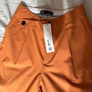 Zara asymmetrical Orange pants.